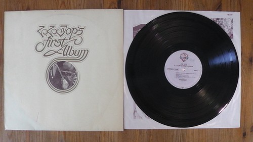 Top first album warner - zz,